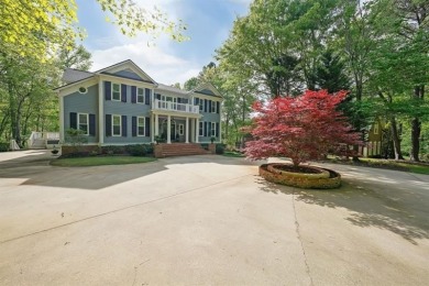 Stepping into this exquisite lakeside retreat, you truly enter on Coweta Club in Georgia - for sale on GolfHomes.com, golf home, golf lot