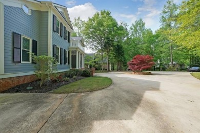 Stepping into this exquisite lakeside retreat, you truly enter on Coweta Club in Georgia - for sale on GolfHomes.com, golf home, golf lot