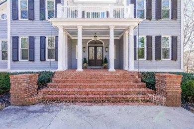 Stepping into this exquisite lakeside retreat, you truly enter on Coweta Club in Georgia - for sale on GolfHomes.com, golf home, golf lot