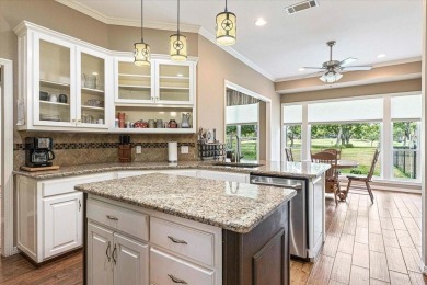 PRIDE OF OWNERSHIP is reflected at every turn in this spacious on Pecan Plantation Country Club in Texas - for sale on GolfHomes.com, golf home, golf lot