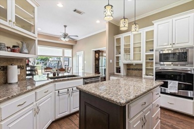 PRIDE OF OWNERSHIP is reflected at every turn in this spacious on Pecan Plantation Country Club in Texas - for sale on GolfHomes.com, golf home, golf lot