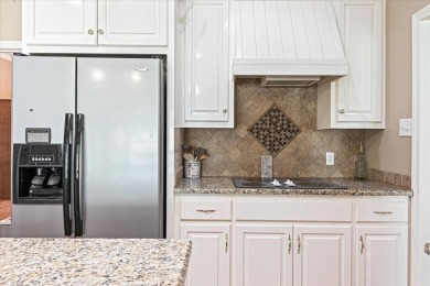 PRIDE OF OWNERSHIP is reflected at every turn in this spacious on Pecan Plantation Country Club in Texas - for sale on GolfHomes.com, golf home, golf lot