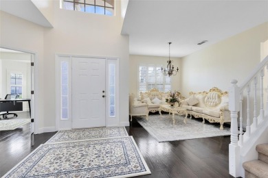 This elegant single-family home in the gated Sandhill Trace on Hunters Creek Golf Course in Florida - for sale on GolfHomes.com, golf home, golf lot