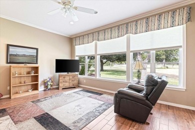 PRIDE OF OWNERSHIP is reflected at every turn in this spacious on Pecan Plantation Country Club in Texas - for sale on GolfHomes.com, golf home, golf lot