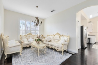 This elegant single-family home in the gated Sandhill Trace on Hunters Creek Golf Course in Florida - for sale on GolfHomes.com, golf home, golf lot