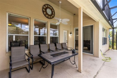 This elegant single-family home in the gated Sandhill Trace on Hunters Creek Golf Course in Florida - for sale on GolfHomes.com, golf home, golf lot