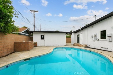 *STOP THE CAR* Welcome to this beautiful pool home in the highly on Skylinks At Long Beach Golf Course in California - for sale on GolfHomes.com, golf home, golf lot