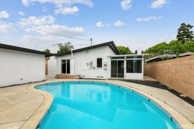 *STOP THE CAR* Welcome to this beautiful pool home in the highly on Skylinks At Long Beach Golf Course in California - for sale on GolfHomes.com, golf home, golf lot