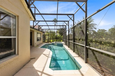 This elegant single-family home in the gated Sandhill Trace on Hunters Creek Golf Course in Florida - for sale on GolfHomes.com, golf home, golf lot