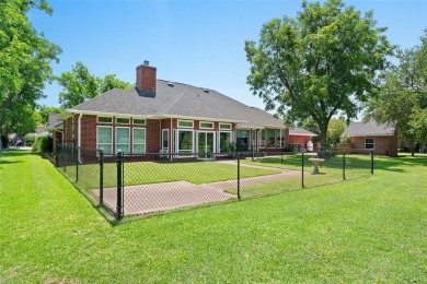 PRIDE OF OWNERSHIP is reflected at every turn in this spacious on Pecan Plantation Country Club in Texas - for sale on GolfHomes.com, golf home, golf lot