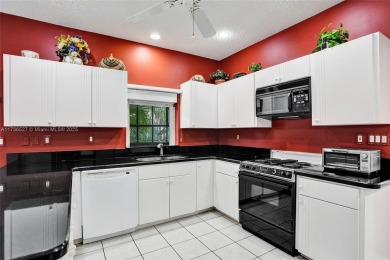 Step into this beautiful 3-bed, 2-bath home in Woodmont's on Woodmont Country Club in Florida - for sale on GolfHomes.com, golf home, golf lot