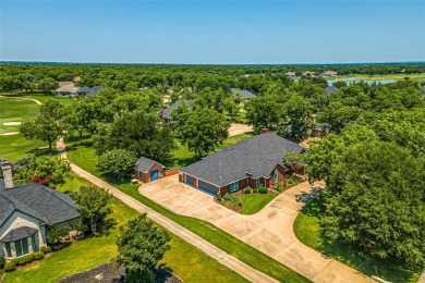 PRIDE OF OWNERSHIP is reflected at every turn in this spacious on Pecan Plantation Country Club in Texas - for sale on GolfHomes.com, golf home, golf lot