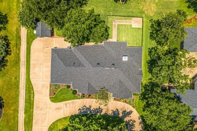 PRIDE OF OWNERSHIP is reflected at every turn in this spacious on Pecan Plantation Country Club in Texas - for sale on GolfHomes.com, golf home, golf lot