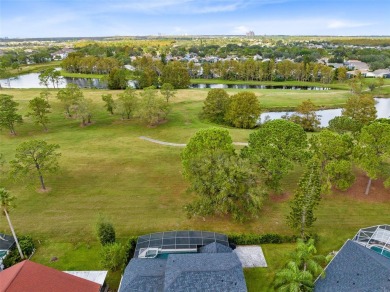 This elegant single-family home in the gated Sandhill Trace on Hunters Creek Golf Course in Florida - for sale on GolfHomes.com, golf home, golf lot