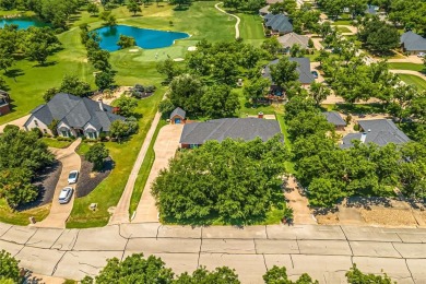 PRIDE OF OWNERSHIP is reflected at every turn in this spacious on Pecan Plantation Country Club in Texas - for sale on GolfHomes.com, golf home, golf lot