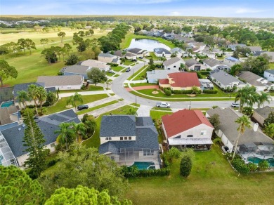 This elegant single-family home in the gated Sandhill Trace on Hunters Creek Golf Course in Florida - for sale on GolfHomes.com, golf home, golf lot