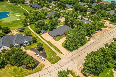 PRIDE OF OWNERSHIP is reflected at every turn in this spacious on Pecan Plantation Country Club in Texas - for sale on GolfHomes.com, golf home, golf lot