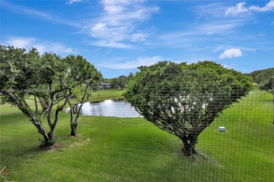 One of best units! Corner  3 bed 2 bath home with golf and lake on Oaks Country Club in Florida - for sale on GolfHomes.com, golf home, golf lot