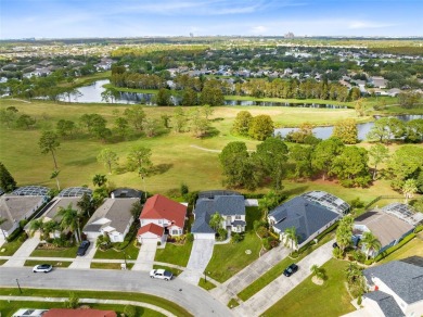 This elegant single-family home in the gated Sandhill Trace on Hunters Creek Golf Course in Florida - for sale on GolfHomes.com, golf home, golf lot