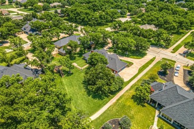 PRIDE OF OWNERSHIP is reflected at every turn in this spacious on Pecan Plantation Country Club in Texas - for sale on GolfHomes.com, golf home, golf lot