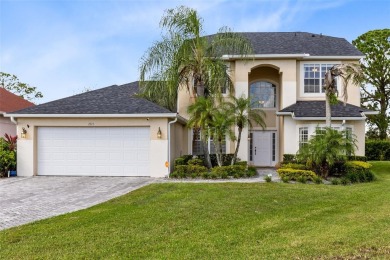 This elegant single-family home in the gated Sandhill Trace on Hunters Creek Golf Course in Florida - for sale on GolfHomes.com, golf home, golf lot