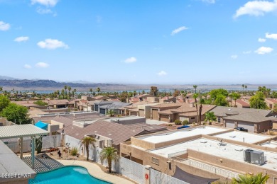 Stunning lakeview pool home located in the Residential Estates on London Bridge Golf Course in Arizona - for sale on GolfHomes.com, golf home, golf lot