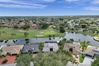 Step into this beautiful 3-bed, 2-bath home in Woodmont's on Woodmont Country Club in Florida - for sale on GolfHomes.com, golf home, golf lot