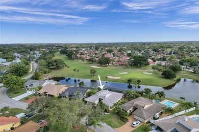 Step into this beautiful 3-bed, 2-bath home in Woodmont's on Woodmont Country Club in Florida - for sale on GolfHomes.com, golf home, golf lot