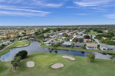 Step into this beautiful 3-bed, 2-bath home in Woodmont's on Woodmont Country Club in Florida - for sale on GolfHomes.com, golf home, golf lot