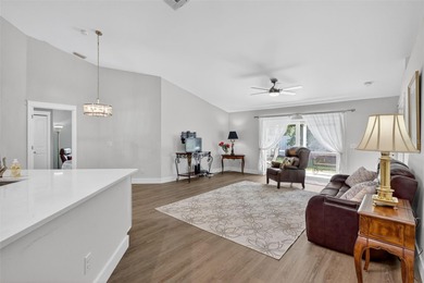 Over $150,000 in upgrades within the past two years make this on Hunters Green Country Club in Florida - for sale on GolfHomes.com, golf home, golf lot