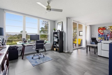 Beautifully updated 2 bedroom, 2 bathroom condo with a den in an on Palm-Aire Country Club and Resort - Palms in Florida - for sale on GolfHomes.com, golf home, golf lot