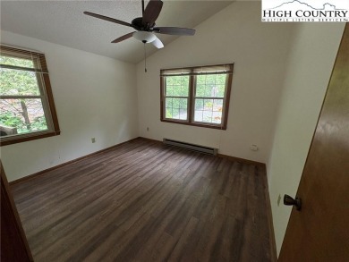 Adorable year-round home on spacious corner lot. One level on Land Harbor Golf Course in North Carolina - for sale on GolfHomes.com, golf home, golf lot