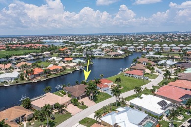 PUNTA GORDA ISLES WATERFRONT HOME W/91FT OF SEAWALL & SAIL on Saint Andrews South Golf Club in Florida - for sale on GolfHomes.com, golf home, golf lot