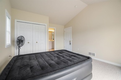 Welcome to this upper-level 2-bedroom, 2-bath condo in the on Charlevoix Golf and Country Club in Michigan - for sale on GolfHomes.com, golf home, golf lot