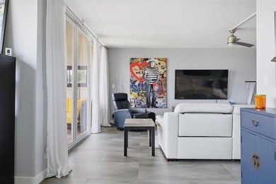 Beautifully updated 2 bedroom, 2 bathroom condo with a den in an on Palm-Aire Country Club and Resort - Palms in Florida - for sale on GolfHomes.com, golf home, golf lot