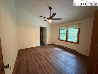 Adorable year-round home on spacious corner lot. One level on Land Harbor Golf Course in North Carolina - for sale on GolfHomes.com, golf home, golf lot