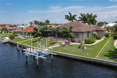 PUNTA GORDA ISLES WATERFRONT HOME W/91FT OF SEAWALL & SAIL on Saint Andrews South Golf Club in Florida - for sale on GolfHomes.com, golf home, golf lot