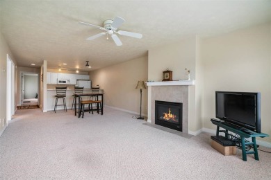 Welcome to this upper-level 2-bedroom, 2-bath condo in the on Charlevoix Golf and Country Club in Michigan - for sale on GolfHomes.com, golf home, golf lot