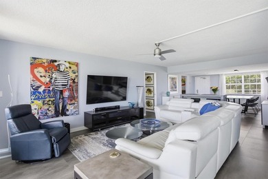 Beautifully updated 2 bedroom, 2 bathroom condo with a den in an on Palm-Aire Country Club and Resort - Palms in Florida - for sale on GolfHomes.com, golf home, golf lot