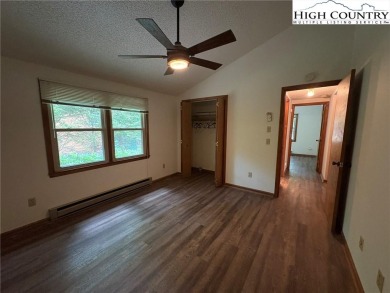 Adorable year-round home on spacious corner lot. One level on Land Harbor Golf Course in North Carolina - for sale on GolfHomes.com, golf home, golf lot