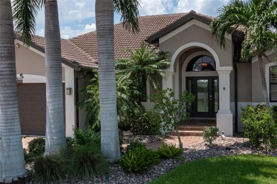 PUNTA GORDA ISLES WATERFRONT HOME W/91FT OF SEAWALL & SAIL on Saint Andrews South Golf Club in Florida - for sale on GolfHomes.com, golf home, golf lot