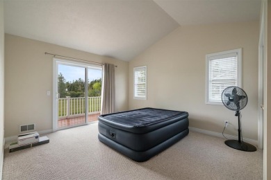 Welcome to this upper-level 2-bedroom, 2-bath condo in the on Charlevoix Golf and Country Club in Michigan - for sale on GolfHomes.com, golf home, golf lot