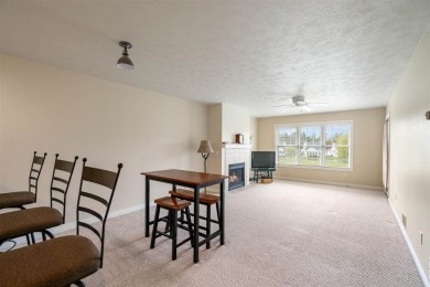 Welcome to this upper-level 2-bedroom, 2-bath condo in the on Charlevoix Golf and Country Club in Michigan - for sale on GolfHomes.com, golf home, golf lot