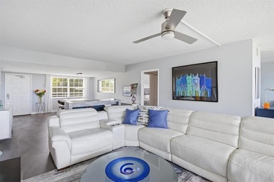 Beautifully updated 2 bedroom, 2 bathroom condo with a den in an on Palm-Aire Country Club and Resort - Palms in Florida - for sale on GolfHomes.com, golf home, golf lot