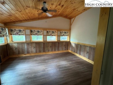 Adorable year-round home on spacious corner lot. One level on Land Harbor Golf Course in North Carolina - for sale on GolfHomes.com, golf home, golf lot