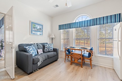 This Champions condo in the vibrant golf community of Sea Trail on Sea Trail Golf Resort in North Carolina - for sale on GolfHomes.com, golf home, golf lot