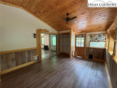 Adorable year-round home on spacious corner lot. One level on Land Harbor Golf Course in North Carolina - for sale on GolfHomes.com, golf home, golf lot