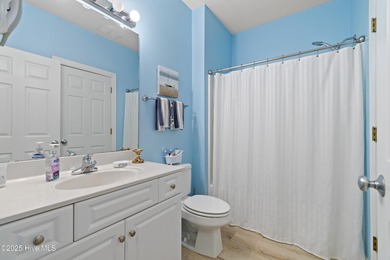 This Champions condo in the vibrant golf community of Sea Trail on Sea Trail Golf Resort in North Carolina - for sale on GolfHomes.com, golf home, golf lot