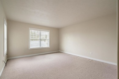 Welcome to this upper-level 2-bedroom, 2-bath condo in the on Charlevoix Golf and Country Club in Michigan - for sale on GolfHomes.com, golf home, golf lot
