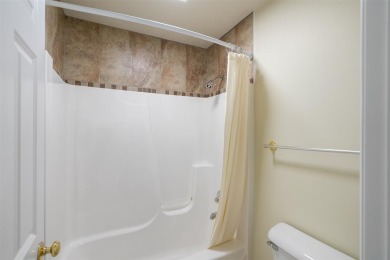 Welcome to this upper-level 2-bedroom, 2-bath condo in the on Charlevoix Golf and Country Club in Michigan - for sale on GolfHomes.com, golf home, golf lot